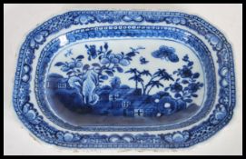 A 19th Century Chinese ceramic tray having hand painted blue and white decoration depicting a