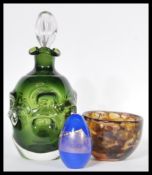 Bo Borgström - Åseda Glasbruk a vintage green glass Thumbprint bottle decanter with glass stopper