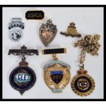 A group of vintage 20th Century enamel fob medals to include a large silver hallmarked example, gold