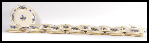 A 20th century Wedgwood and Co tea set in the Chelmsford pattern, consisting of twelve cups,