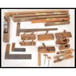 A good collection of vintage 20th Century wood working tools to include a selection of plains,