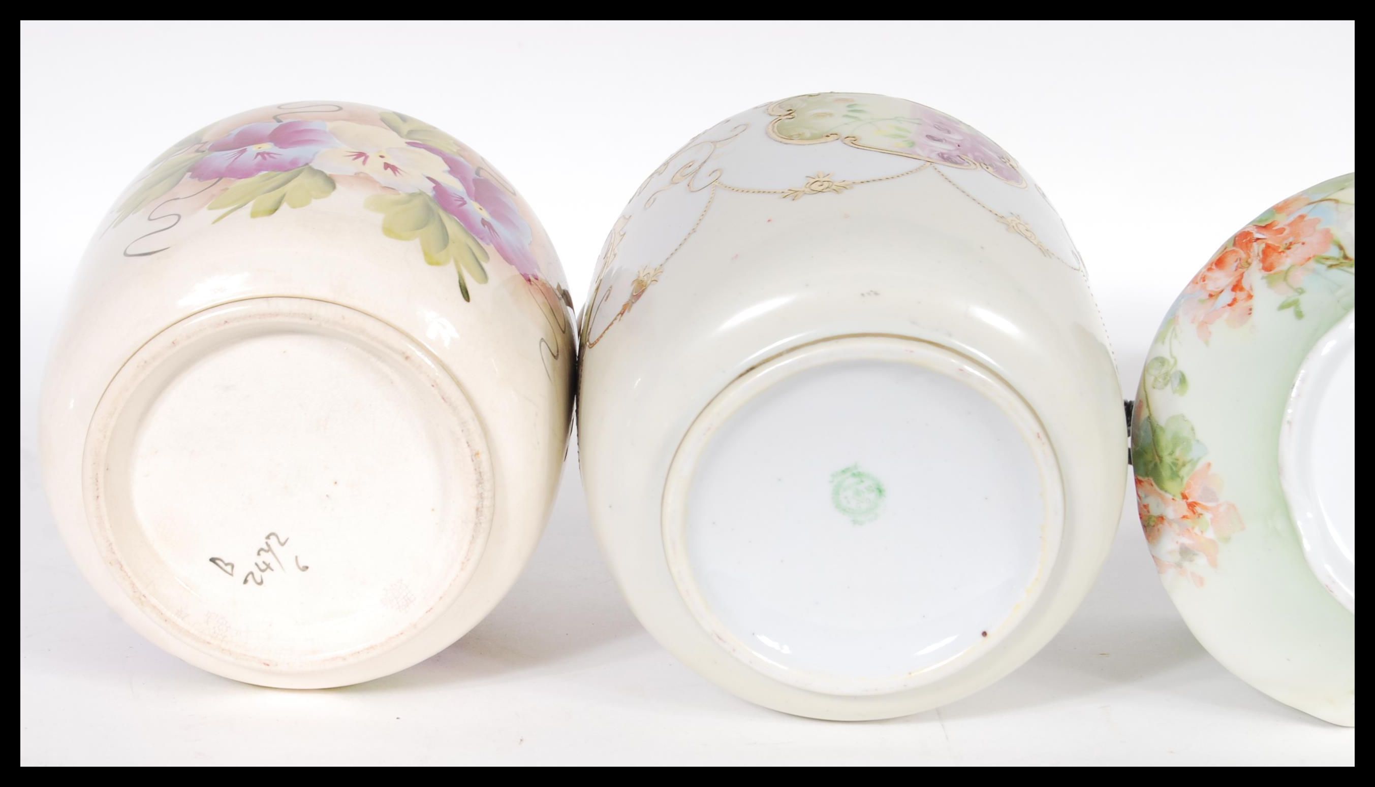 A collection of ceramic biscuit barrels dating from the early 20th Century to include Ivory blush - Image 5 of 7