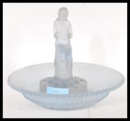 A 1930's Art Deco blue frosted glass flower bowl with Art Deco lady flower frog to centre, within