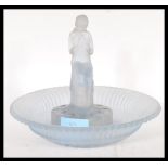 A 1930's Art Deco blue frosted glass flower bowl with Art Deco lady flower frog to centre, within