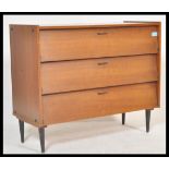 A retro vintage 20th Century teak wood Danish influence chest of drawers, having a run of three