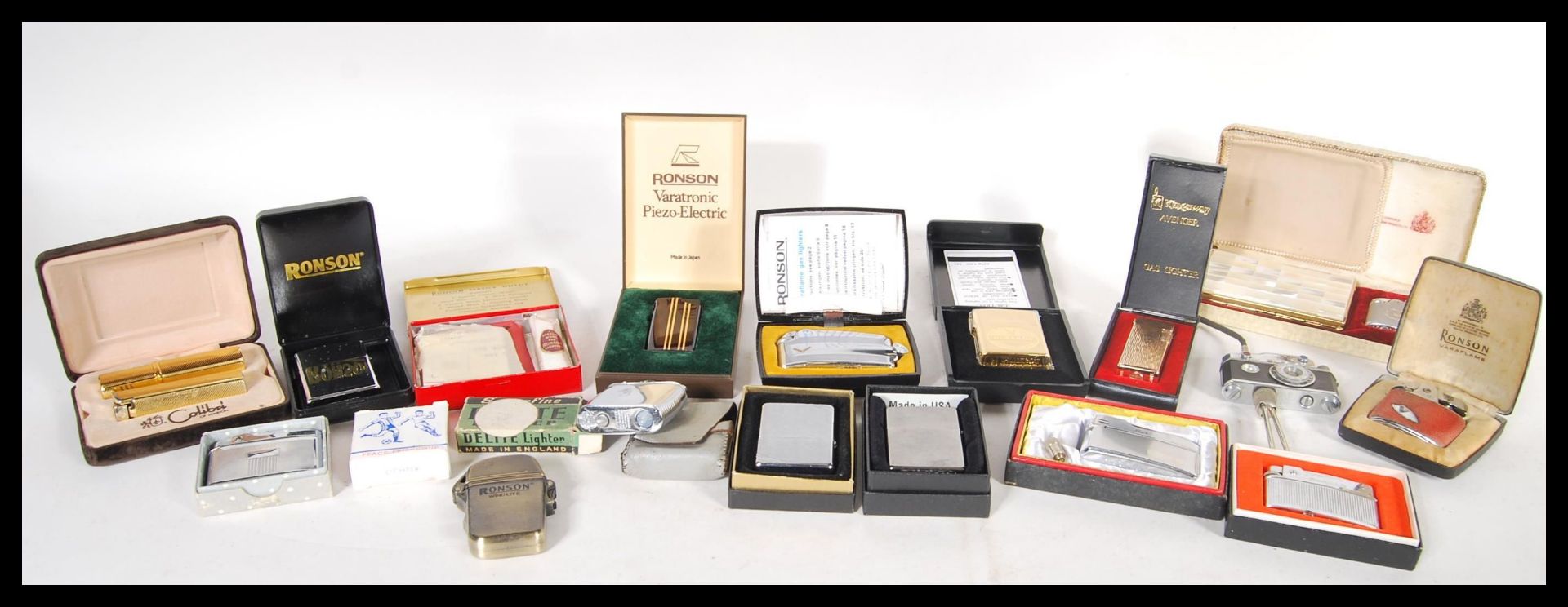 A collection of vintage lighters all in original boxes to include, Ronson, Zippo, Playboy, Sarome,