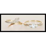 Two 20th Century 9ct gold rings to include a ring set with three white stones and accent stones to
