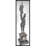 A 19th Century Victorian spelter figurine statue of a knight raised on black marble pedestal
