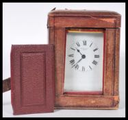 A 19th Century Victorian gilt brass cased carriage clock by Russell Ltd of Liverpool. The white