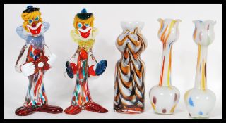 A pair of retro 20th Century studio glass clowns by Murano together with three retro studio glass