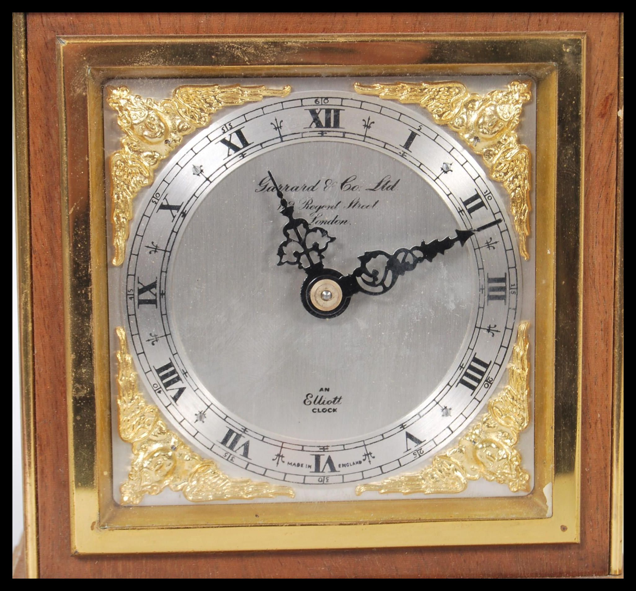 A 20th Century Elliot mantel clock retailed by Garrard & Co Ltd, having a silvered face with roman - Image 2 of 3