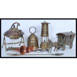 A collection of vintage and antique copper and brass metal wares to include a brass large horse