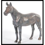 An early 20th Century silver plated figurine in the form of a horse. The horse of good size with