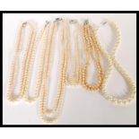 A collection of vintage 20th Century graduating pearl bead necklaces complete in vintage jewellery