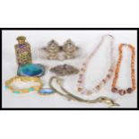 A collection of vintage jewellery to include a French gilt metal perfume bottle, marcasite and