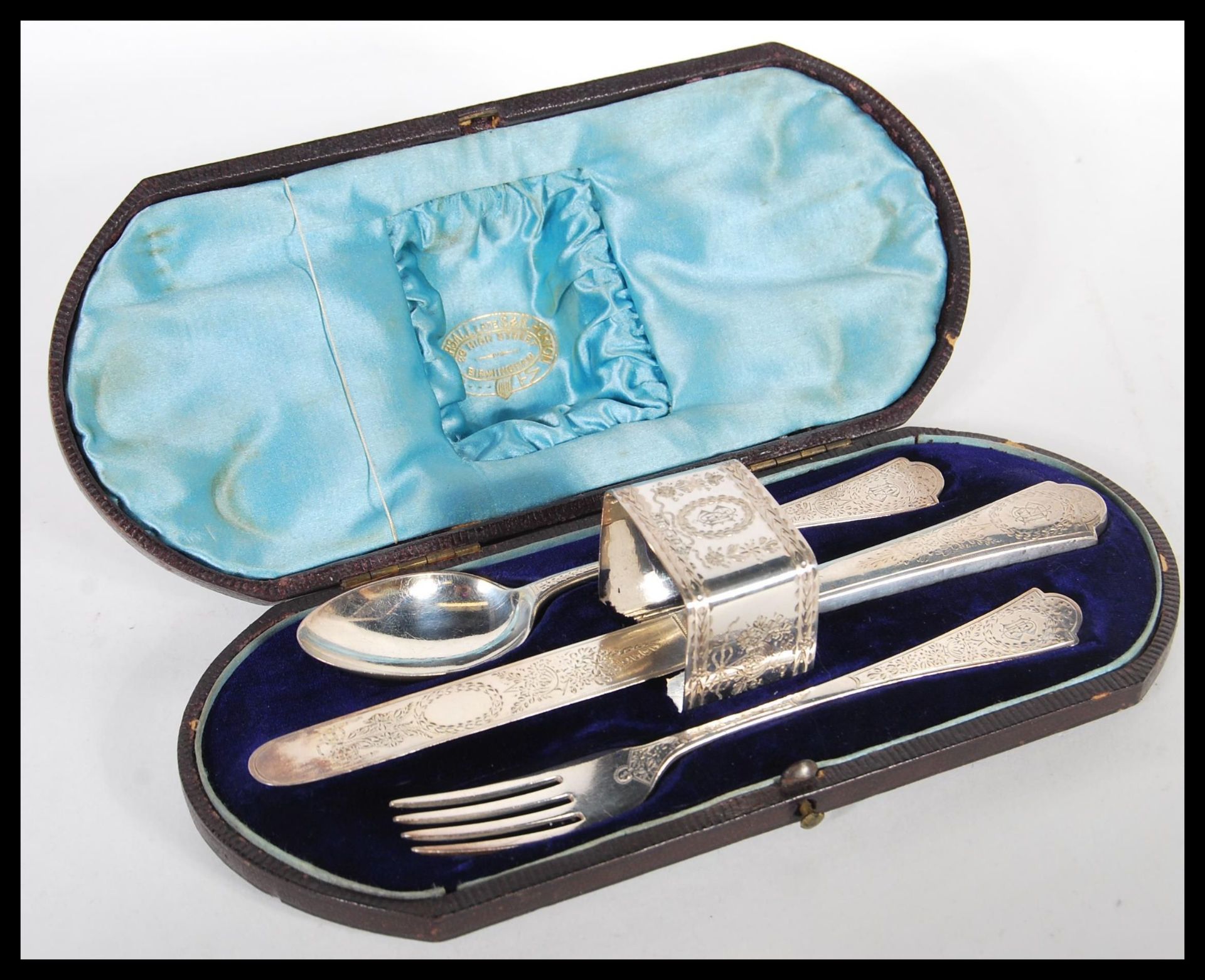 A silver hallmarked Victorian Christening cutlery set to include by Richard Martin & Ebenezer Hall