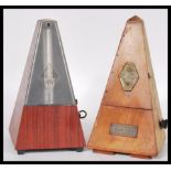 A vintage 20th Century Triangular cased wooden metronome with applied brass mounts Metronome by