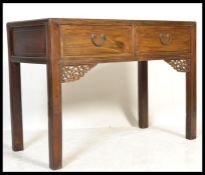 A 20th Century Chinese elm alter / side table, two drawers to the front with fitted drop handles