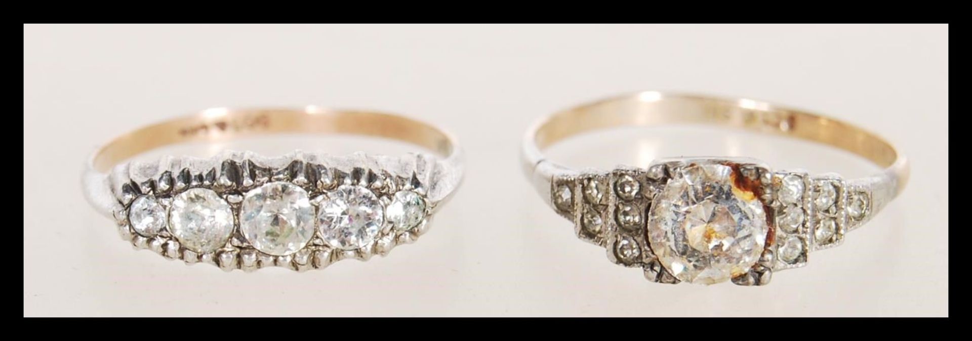 Two early 20th century Art Deco stamped 9ct gold and silver rings to include a gold ring set with