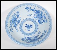 A 19th Century Chinese porcelain bowl having hand painted blue and white decoration depicting floral