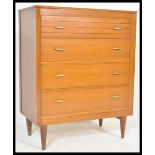 A vintage mid 20th Century oak modernist chest of drawers. The bank of four drawer having