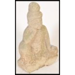 A well weathered garden reconstituted stone figure of Buddha Seated in vajra position, hands cast in