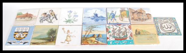 A collection of decorative tiles to include Persian style tiles, Delft, hand painted tiles etc.