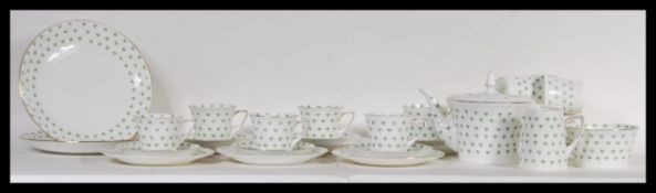 A vintage retro Art Deco 1930's Heathcote china tea service in the Blossom pattern, having a white