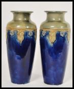 A pair of Royal Doulton baluster vases, circa 1930, decorated with a two tone blue and grey/green