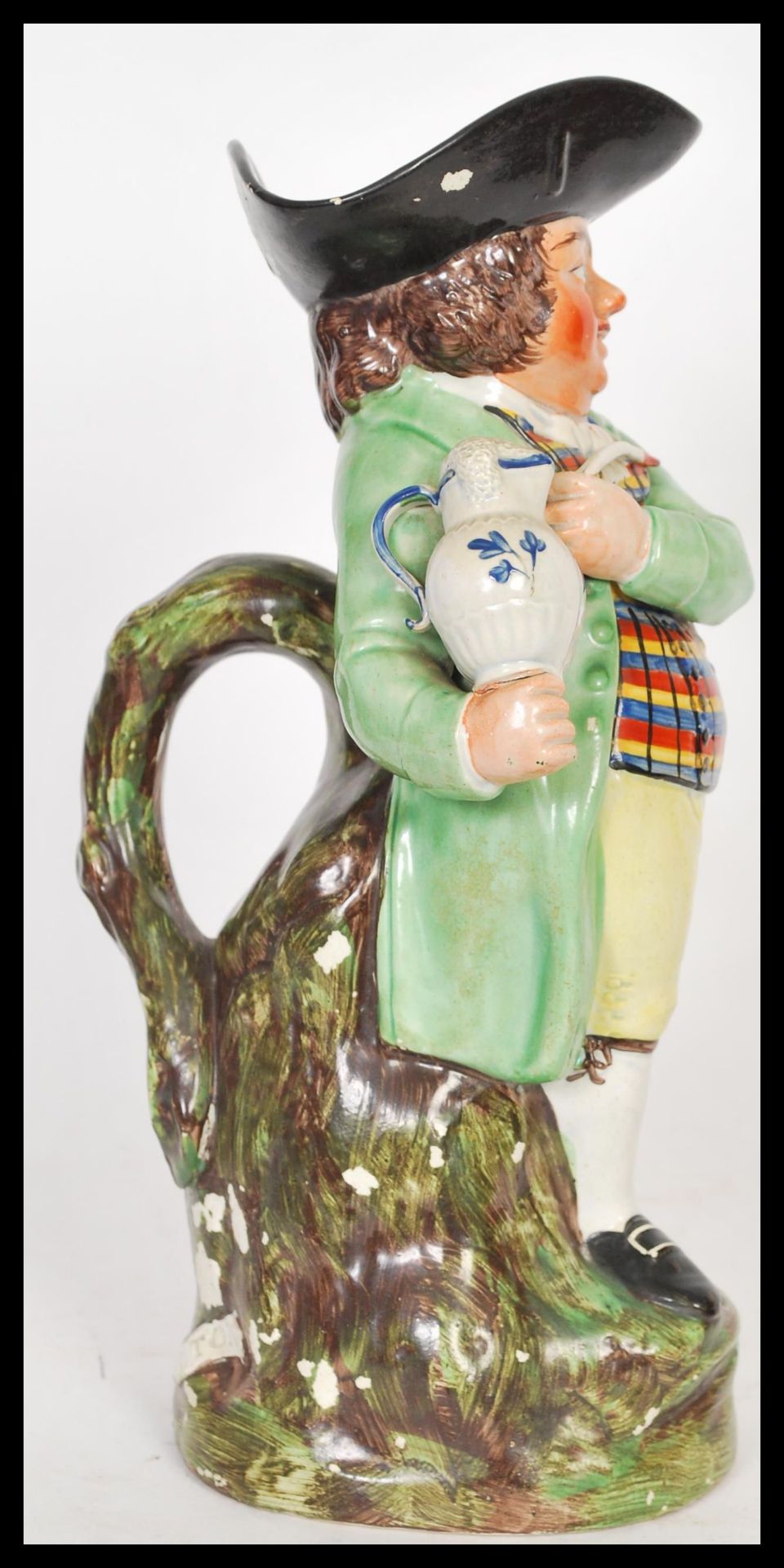 A early 19th Century Staffordshire Toby fillpot jug, the gentleman being dressed in a light green - Bild 2 aus 6