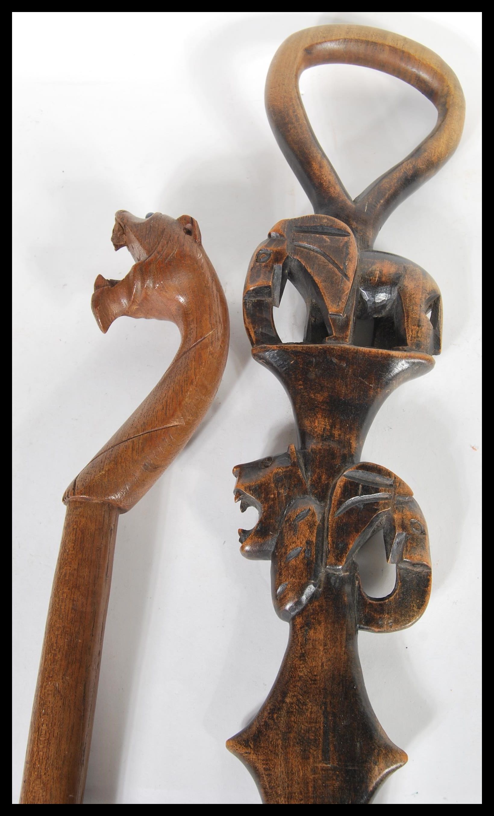 Two vintage walking canes to include a vintage carved African cane carved with Elephant and Tiger - Image 2 of 4