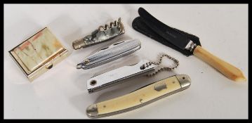 A collection of vintage penknives to include IXL George Wostenolm Sheffield folding pen knife, a