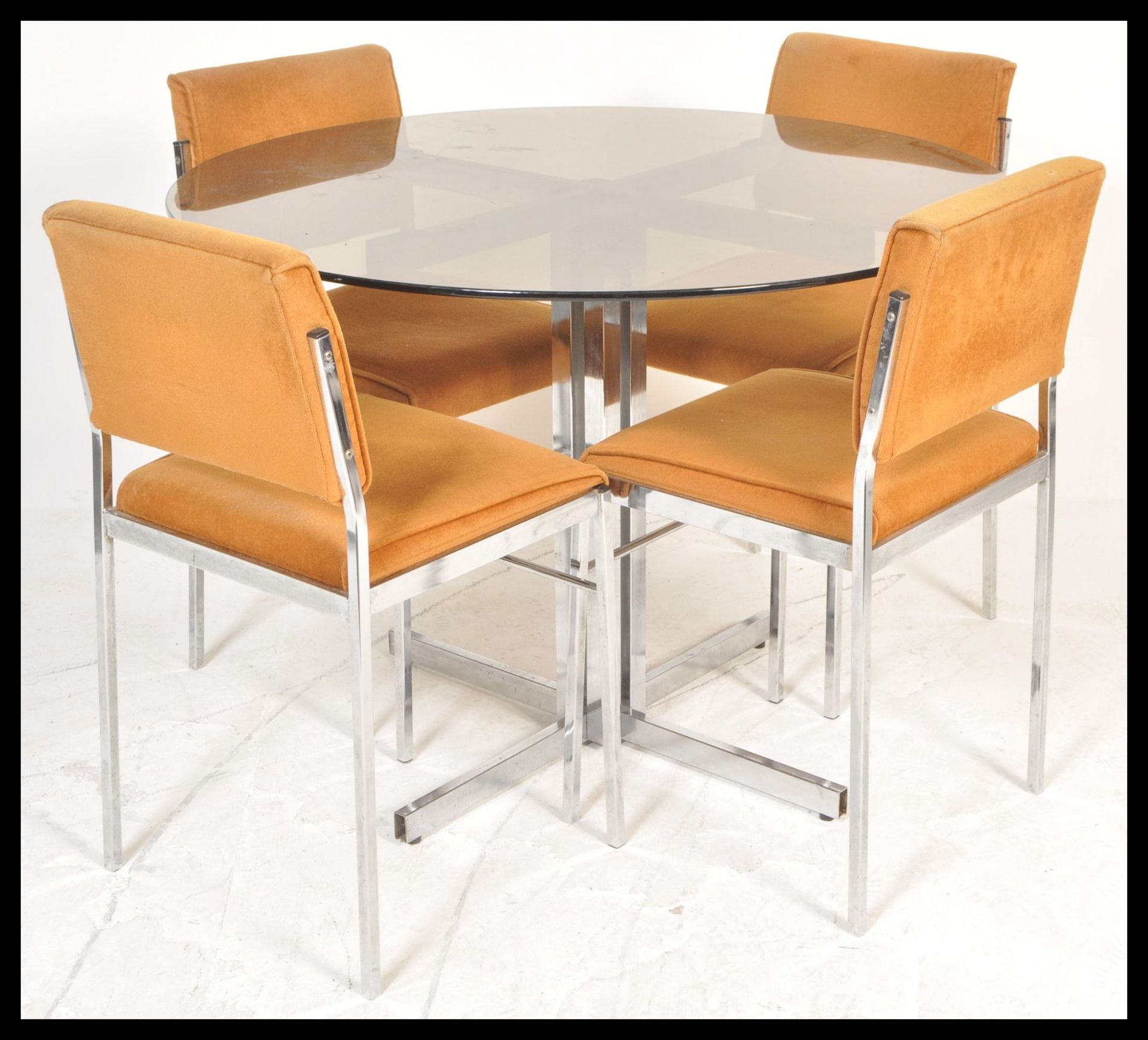 A vintage 20th Century retro chrome and glass dining table and chairs suite.The table raised on x - Bild 2 aus 5