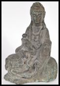 A good Chinese cast iron figure modelled as the Bodhisattva samantabhadra seated in lalitasana on