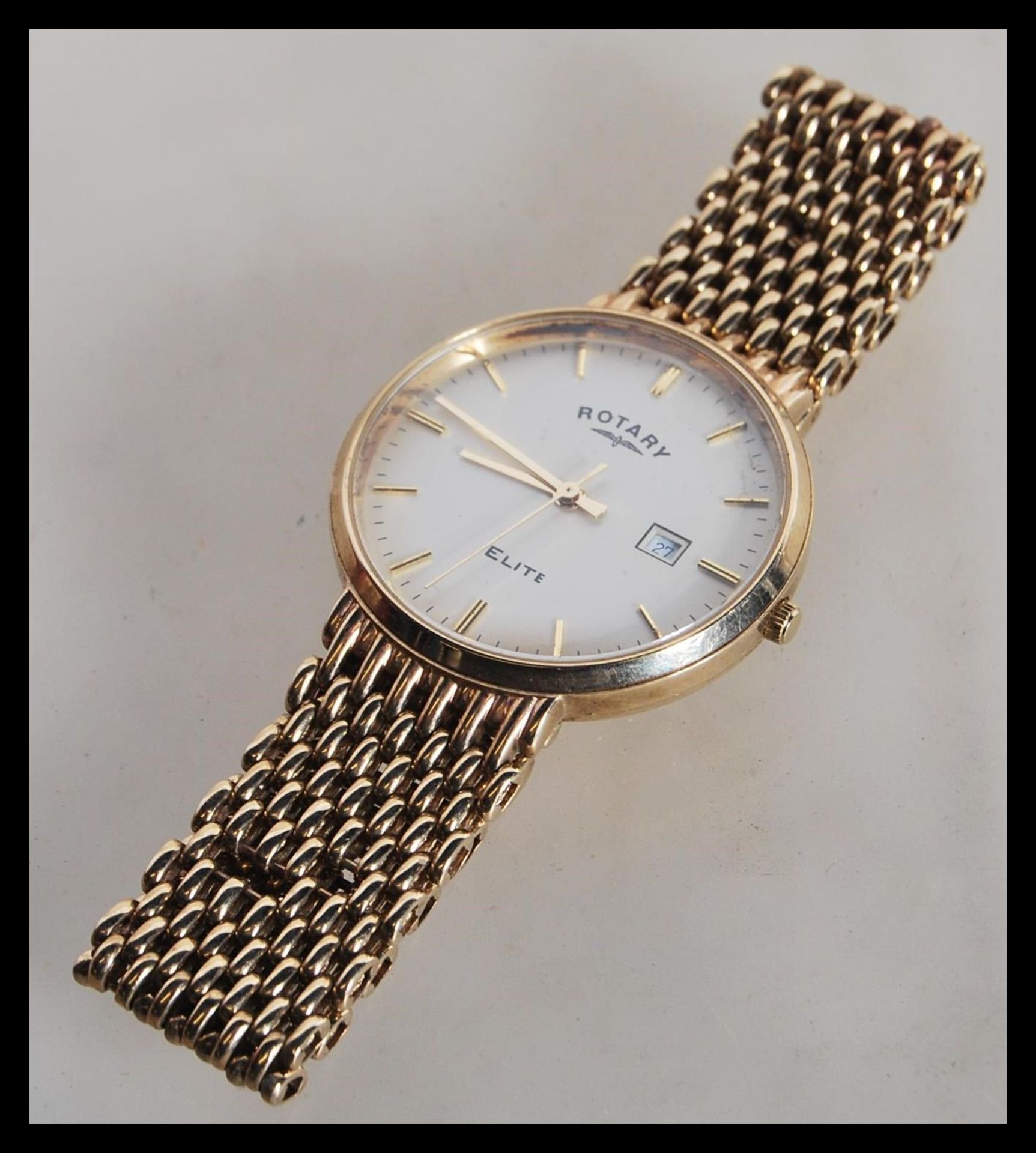 A boxed Rotary Elite 9ct gold gents watch set to a 9ct gold mesh watch bracelet strap. The white - Bild 2 aus 5