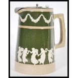 A 19th Century Copeland late Spode stoneware water jug with hinged silver plated lid to top, green