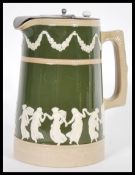 A 19th Century Copeland late Spode stoneware water jug with hinged silver plated lid to top, green