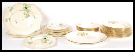 A 20th Century Art Deco Bella Vista dinner service by Johnson Bros alsong with a near matching