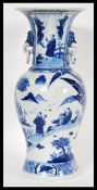 A 19th Century Chinese hand painted blue and white porcelain vase of baluster form having waisted