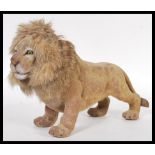 A vintage retro 1960's nodding dog toy in the form of a lion having a rabbits fur mane. Meaasures