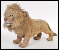 A vintage retro 1960's nodding dog toy in the form of a lion having a rabbits fur mane. Meaasures
