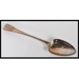 A 19th Century Georgian George IV silver hallmarked tablespoon / serving spoon, Exeter assay mark,