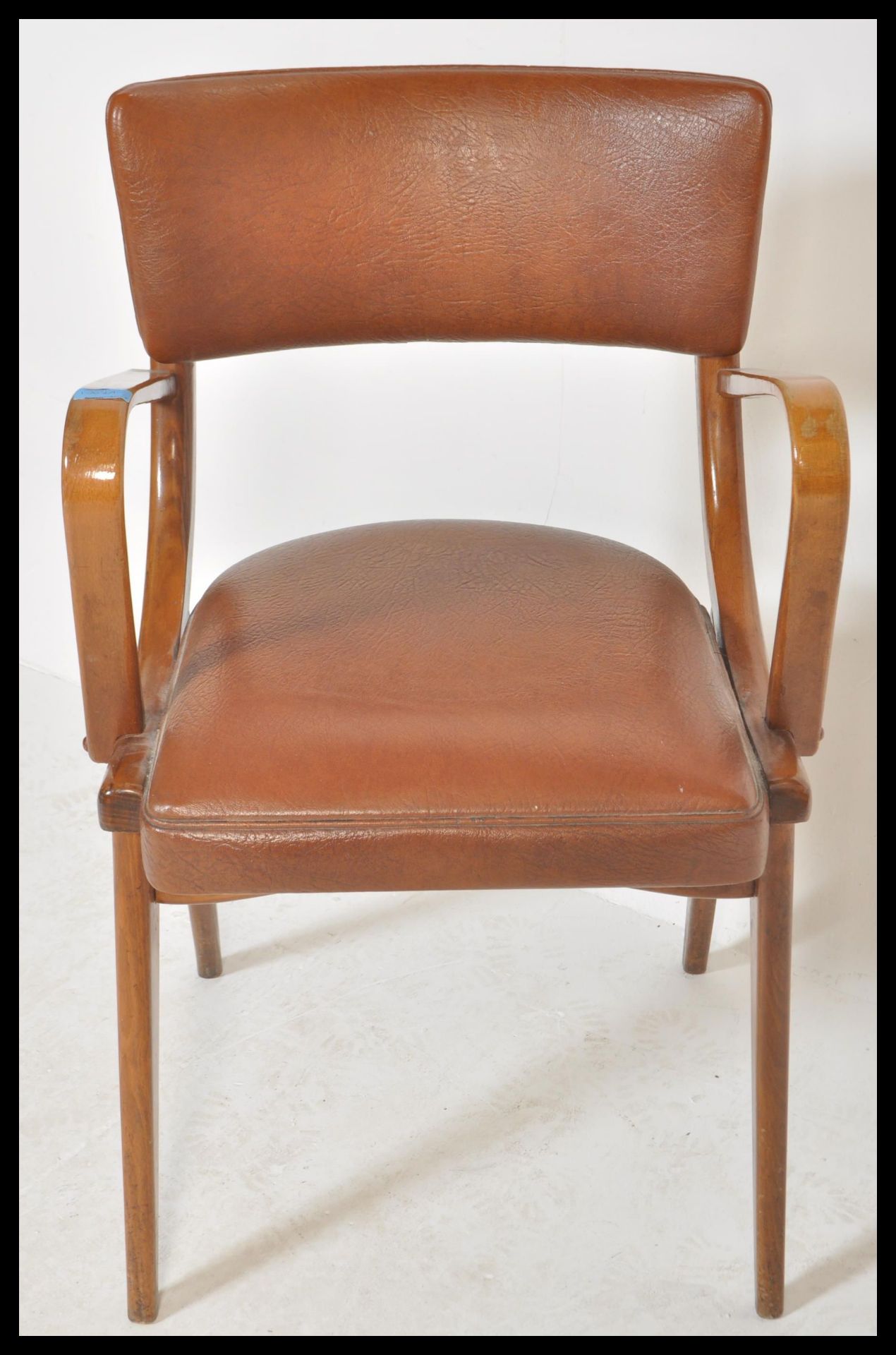 A vintage retro 20th Century Ben Chairs armchair raised on shaped angular legs with leather / faux - Bild 4 aus 5