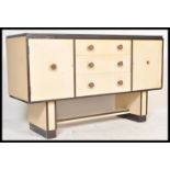 A vintage retro mid 20th Century 1950's post war Art Deco sideboard credenza unit having a central