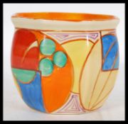 A 20th Century octagonal Clarice Cliff Fantasque Melon bizzare pattern planter/vase. Marked to base.