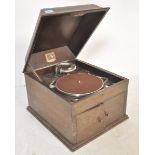 An Edwardian circa 1920's HMV model 109 oak cased table top gramophone, fitted with a No 4 sound box