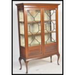 A early 20th Century fine Edwardian mahogany inlaid glazed china display cabinet - bookcase in the