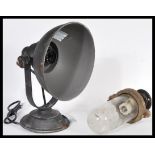 A pair of matching 20th Century Industrial style spotlights together with a vintage 20th Century