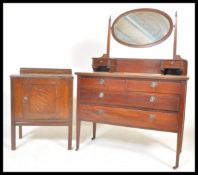An early 20th Century Edwardian dressing table having two over two drawers with ring handles, on
