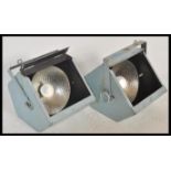 A pair of vintage retro 20th Century theatre stage spotlight spot lamps having brushed steel metal